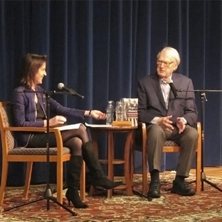 Two individuals sitting in discussion at an FDR Library event