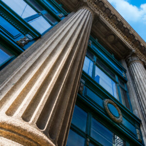 Grey marble column details on building