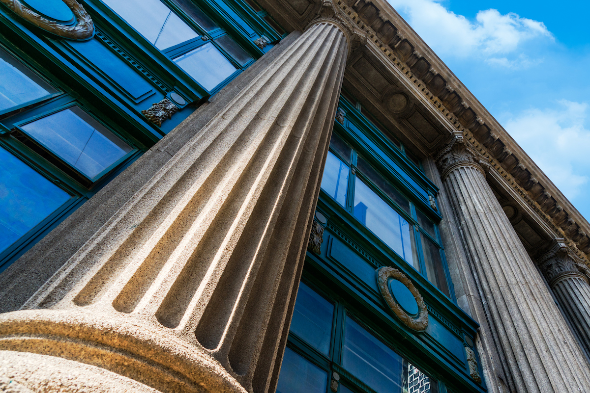 Grey marble column details on building