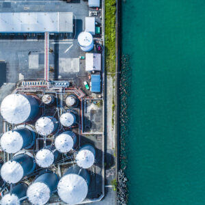 Aerial view. Piping and tanks of industrial factory - stock photo