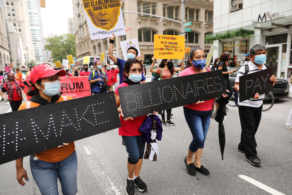 Activists March In Manhattan Calling For A Tax On Billionaires